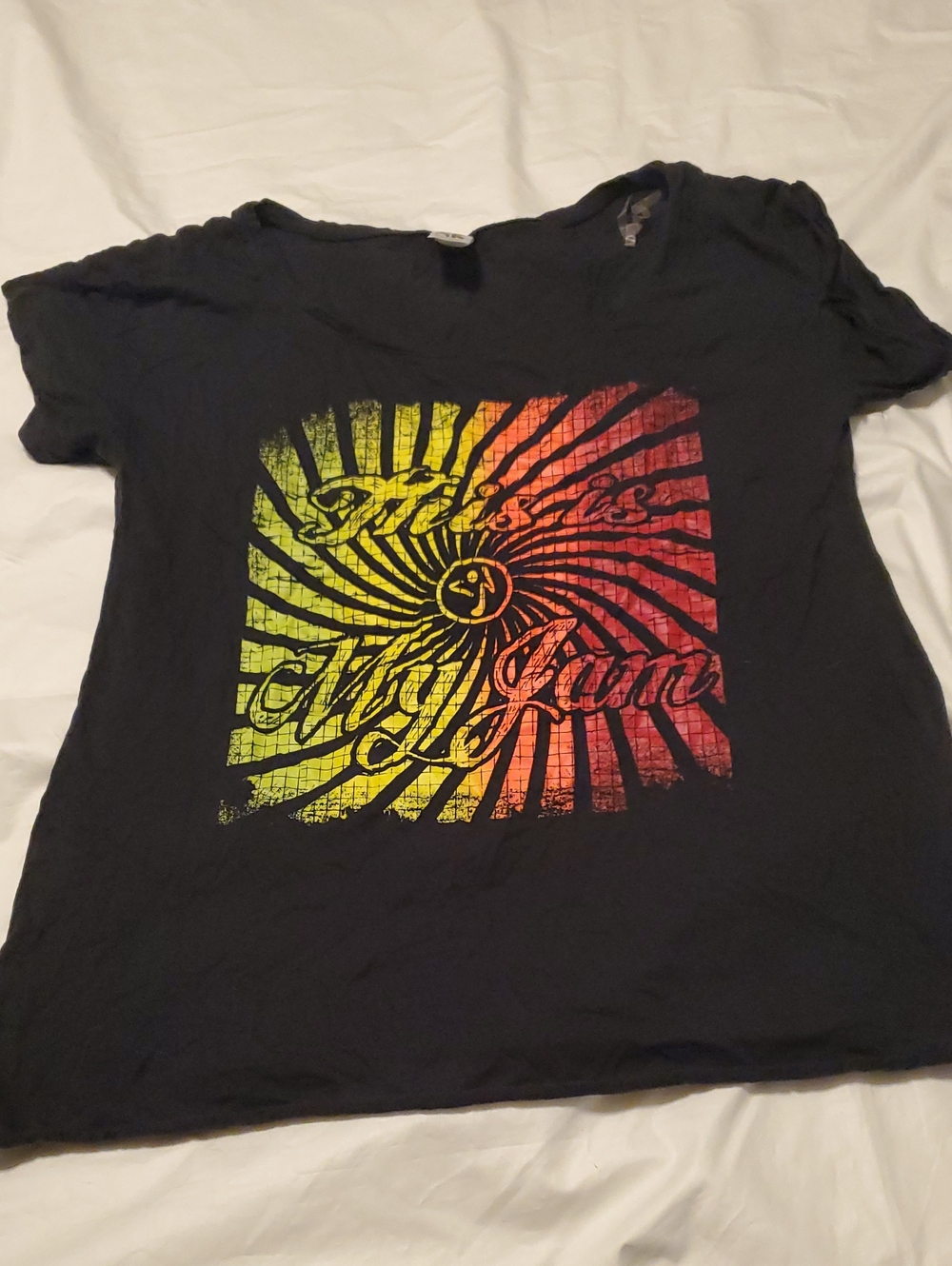 Zumbawear size Medium Black Women's Graphic Tee with Yellow-Red Ombre Print